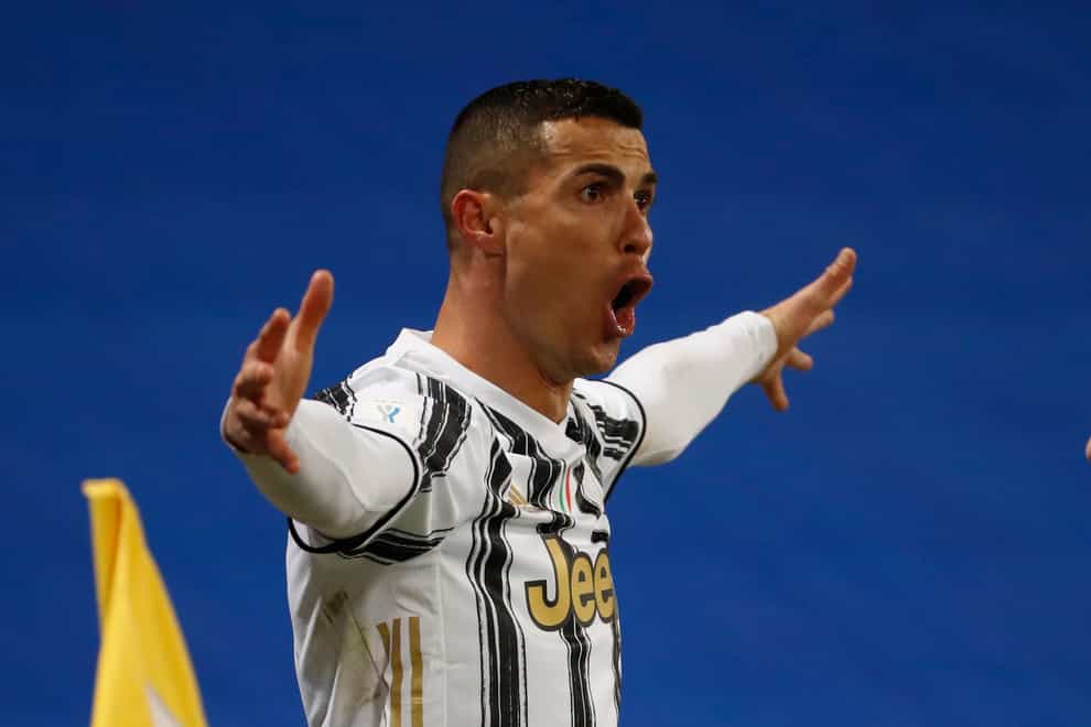 Cristiano Ronaldo celebrates scoring against Napoli
