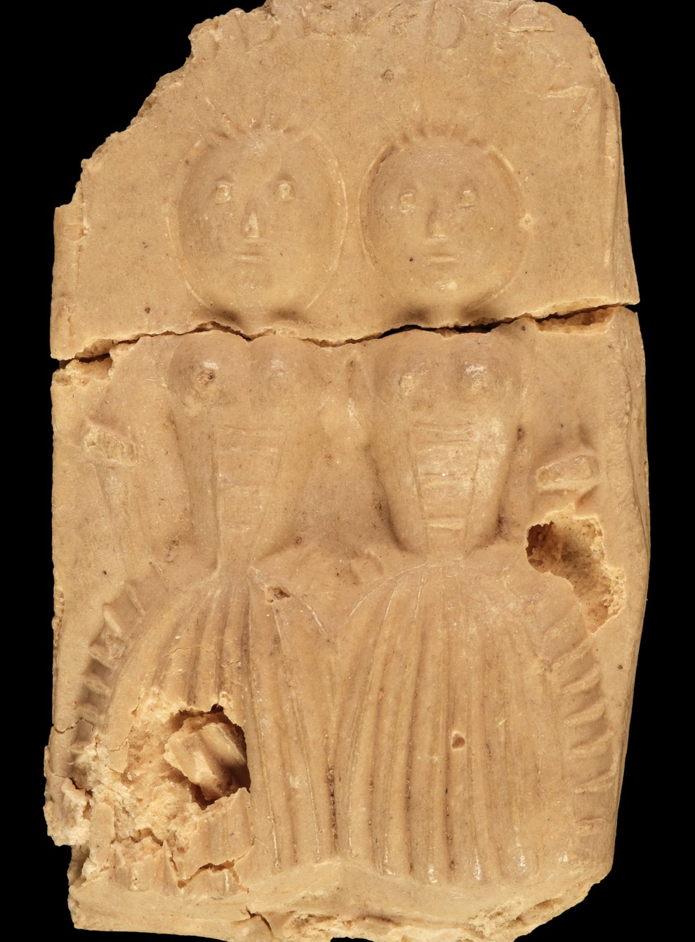 A Biddenden Cake with an image of Mary and Eliza Chulkhurst
