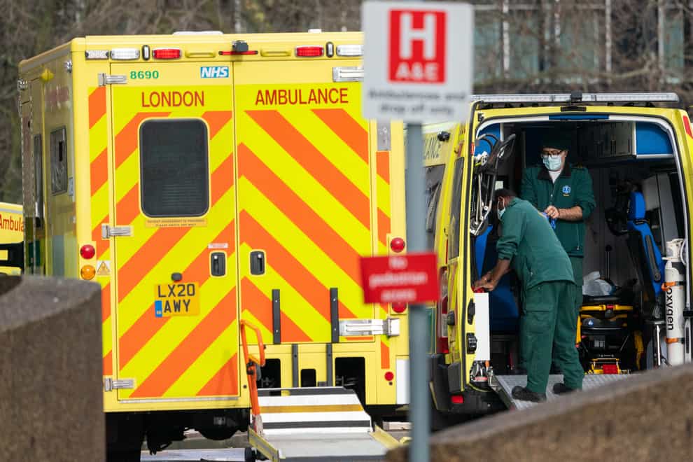Paramedics and ambulances outside St Thomas’ Hospital in central London on January 21 2021 (Dominic Lipinski/PA)