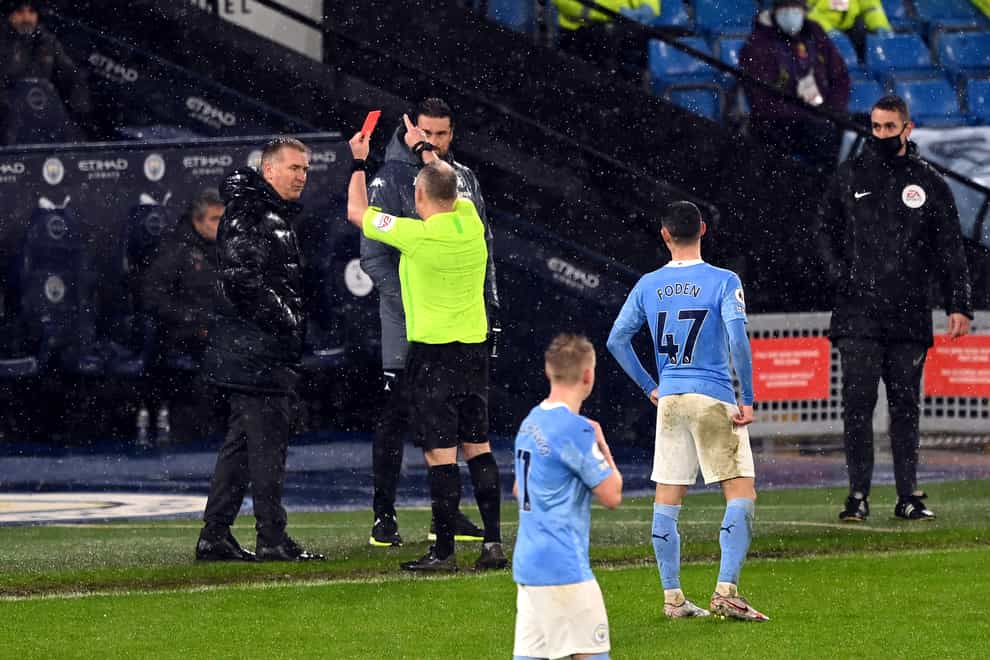 Aston Villa manager Dean Smith was sent off by referee Jon Moss at Manchester City on Wednesday