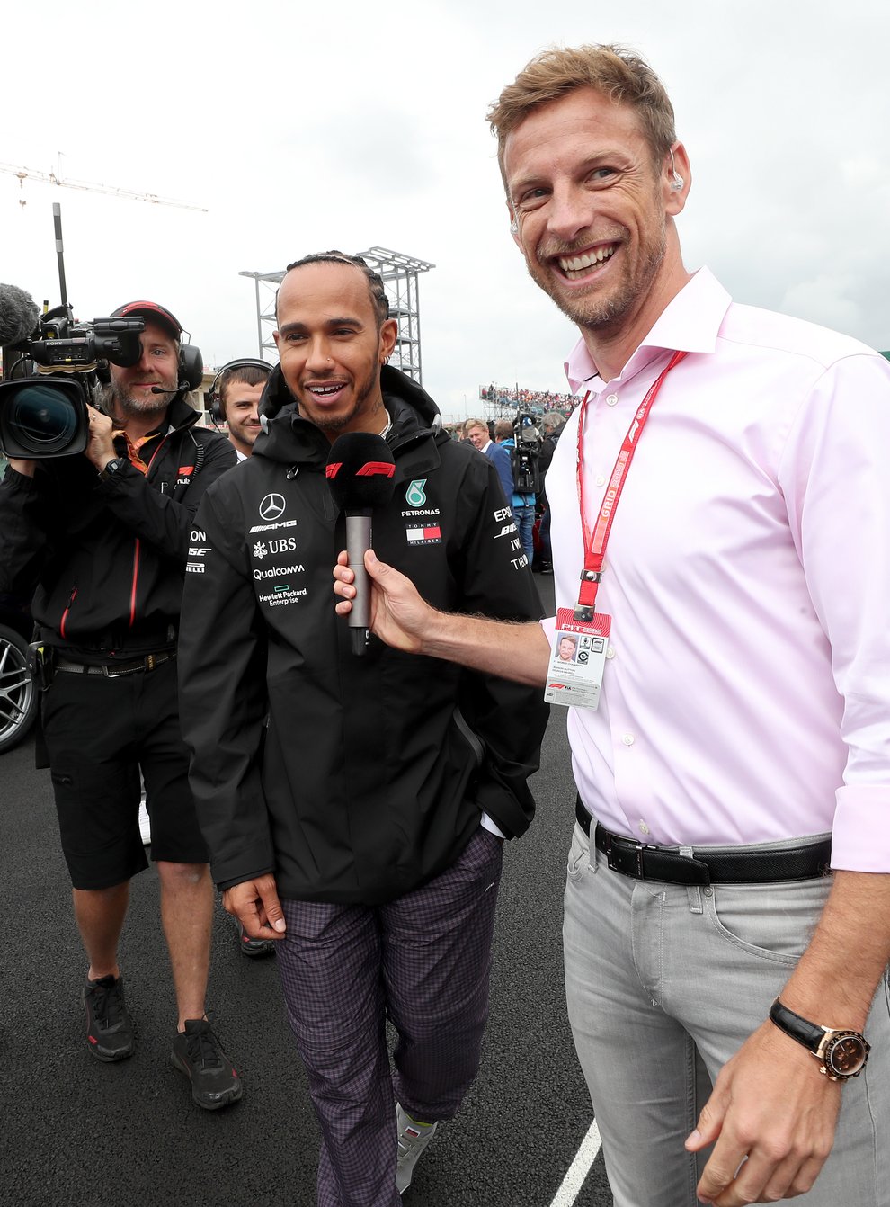 Jenson Button (right) interviews Lewis Hamilton (left)