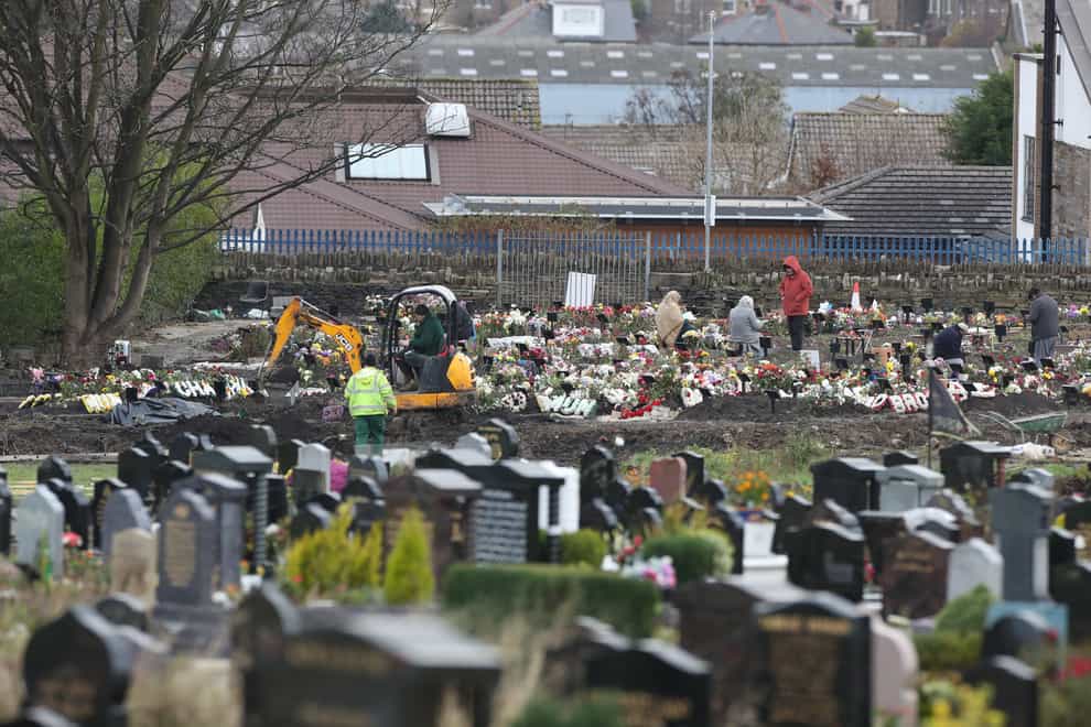 Workers at Scholemoor Cemetery and Crematorium, in Bradford, West Yorkshire (Danny Lawson/PA)