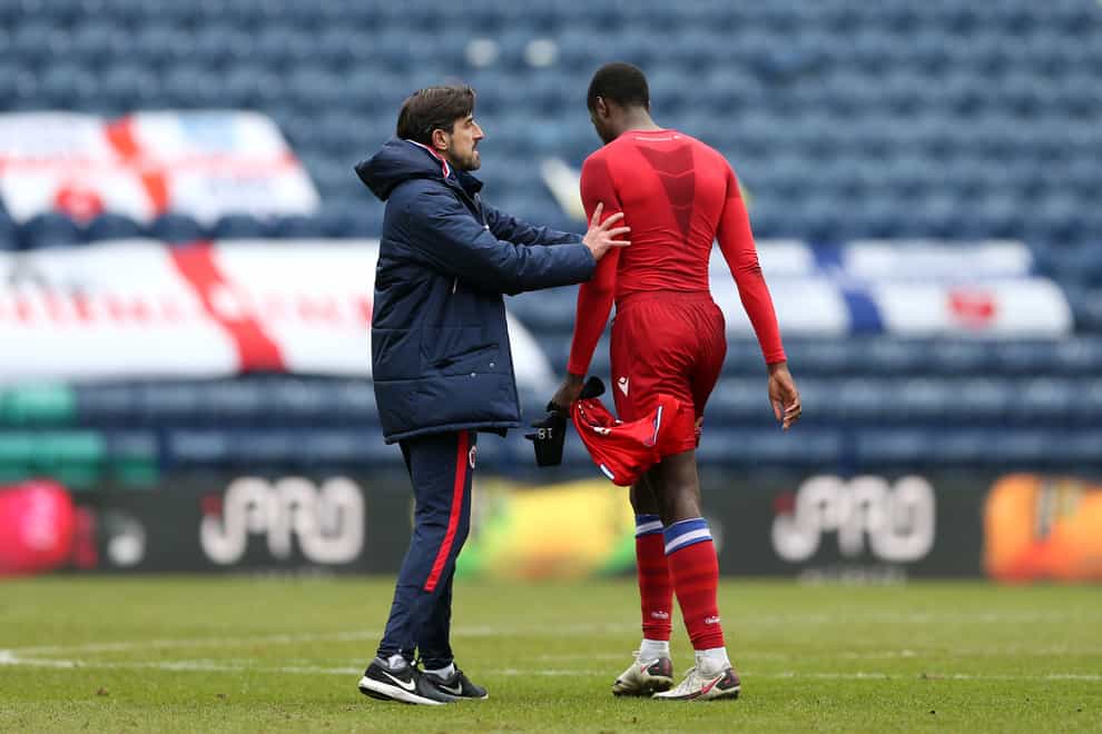 Reading’s Lucas Joao (right) is consoled by manager Veljko Paunovic