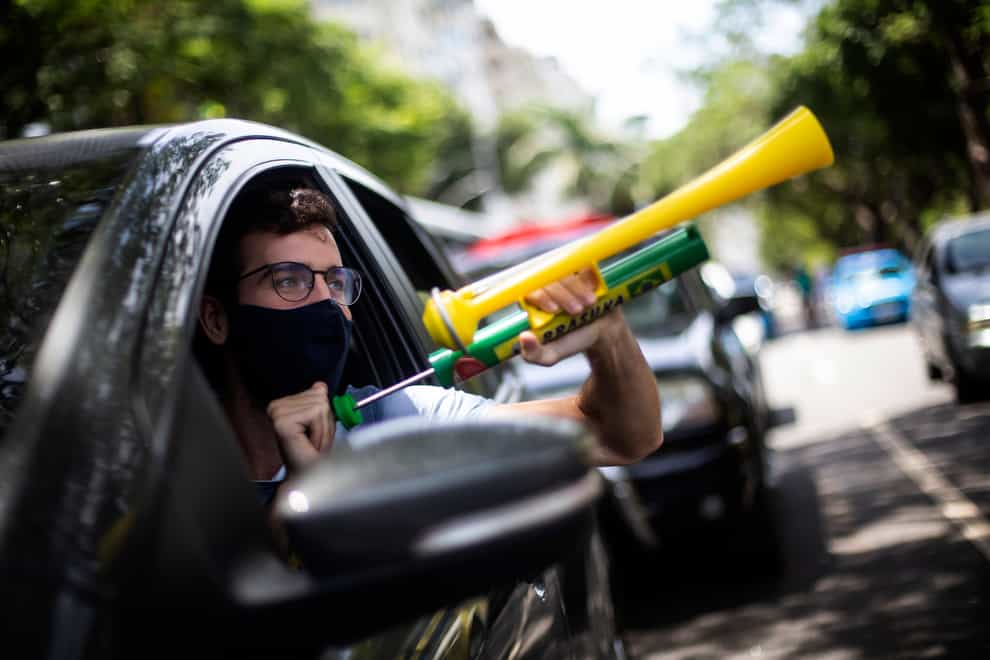 Virus Outbreak Brazil Protest