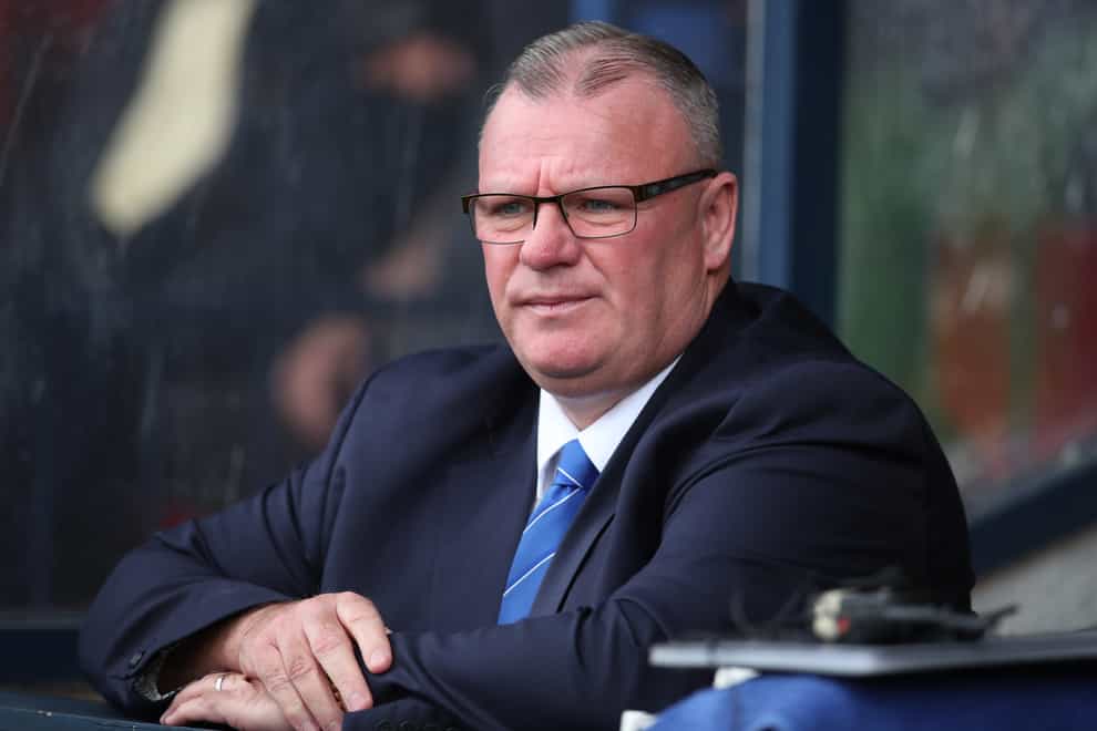 Steve Evans, pictured, has added Robbie Cundy to Gillingham's ranks
