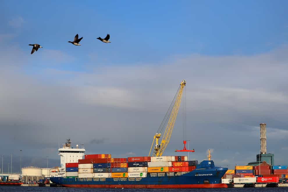 A cargo ship is loaded in Dublin Port