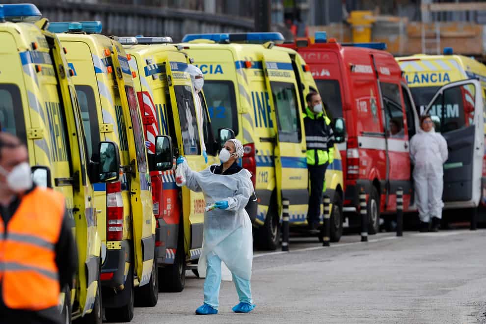 Ambulances queue outside a hospital in Lisbon