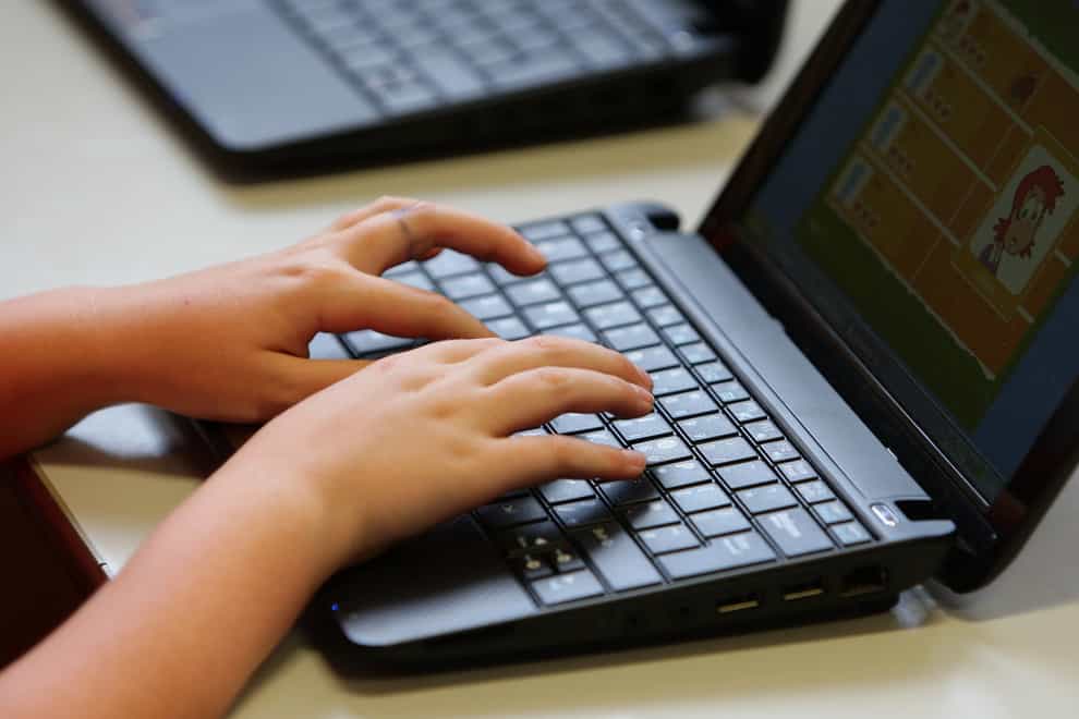 A pupil using a laptop