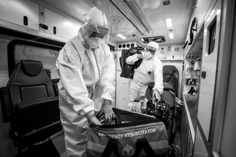 Student EMT Ruth Corscadden, left, and paramedic Daniel McCollam wearing full PPE during their shift for the Northern Ireland Ambulance Service covering the Northern Trust’s hospitals