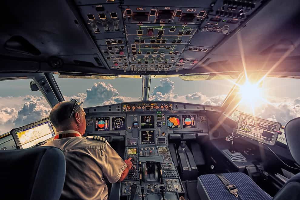 Pilot in a cockpit (iStock/PA)