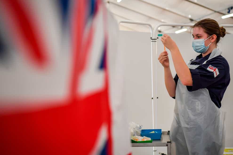 Royal Navy personnel prepare to give vaccines to the public (Ben Birchall/PA)