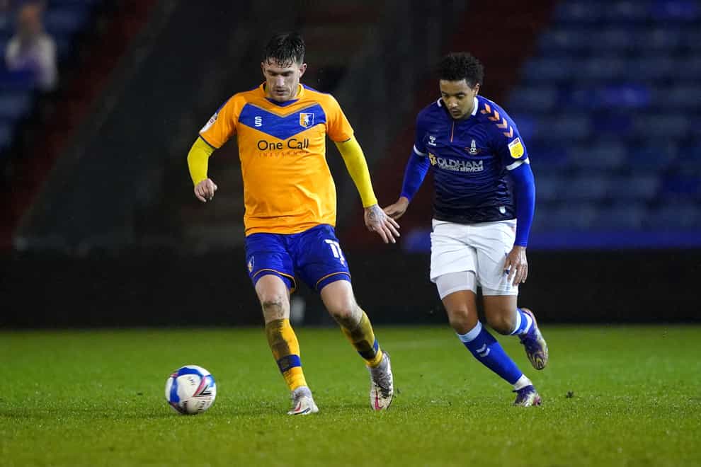 Andy Cook, left, in action for Mansfield