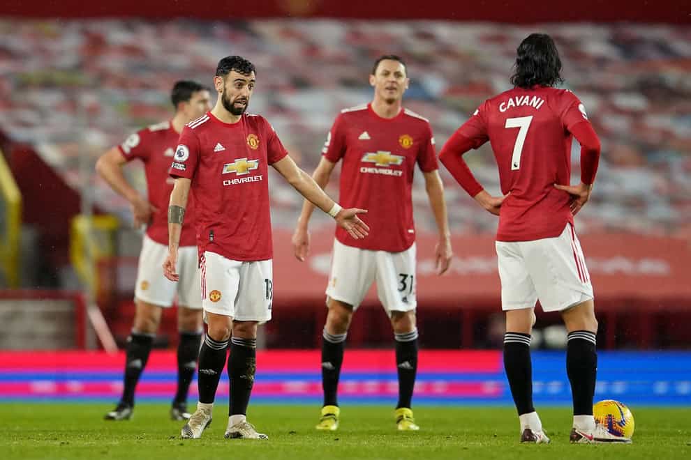 Manchester United's players appear dejected during their home defeat to Sheffield United