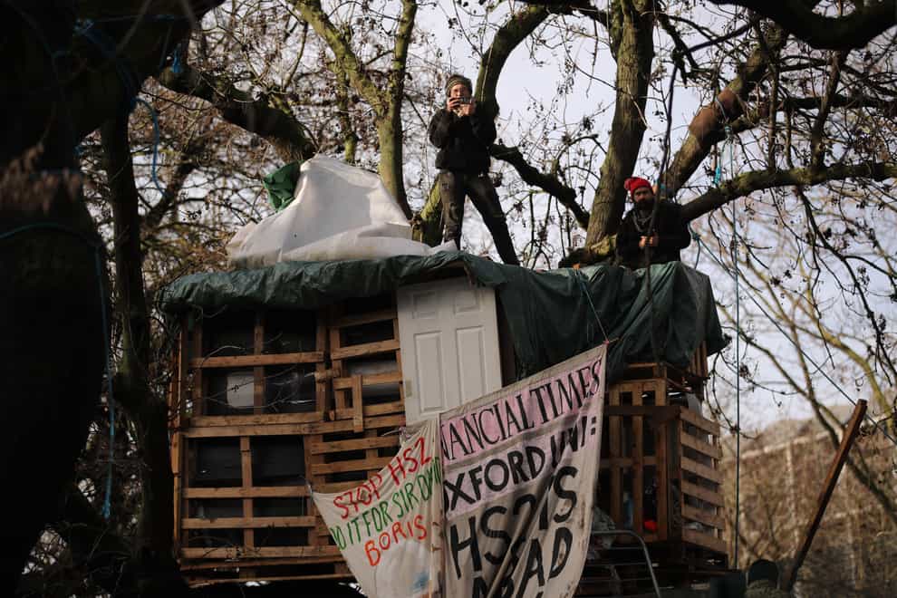 HS2 protesters in trees at the encampment in Euston Square Gardens (Aaron Chown/PA)