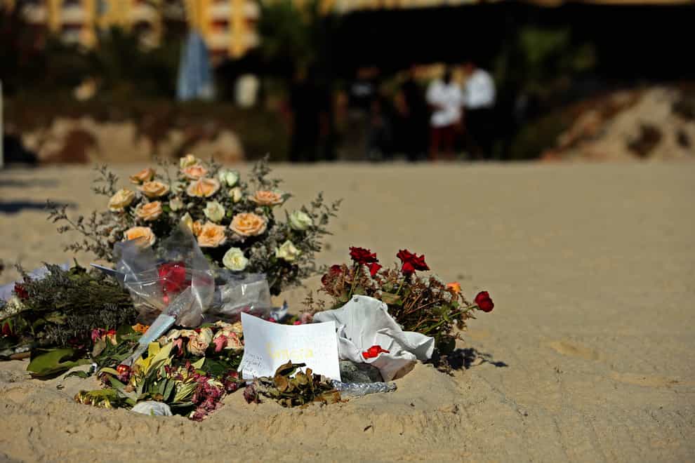 Flowers on the beach near the RIU Imperial Marhaba hotel in Sousse, Tunisia, where 38 people lost their lives after a gunman stormed the beach (Steve Parsons/PA)