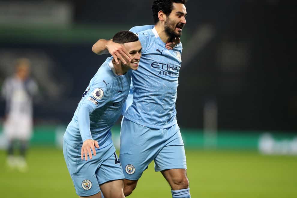 Ilkay Gundogan (right) has impressed for Manchester City this season