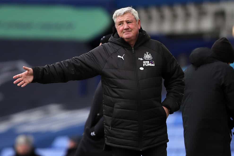 Newcastle manager Steve Bruce gestures with his arm on the touchline