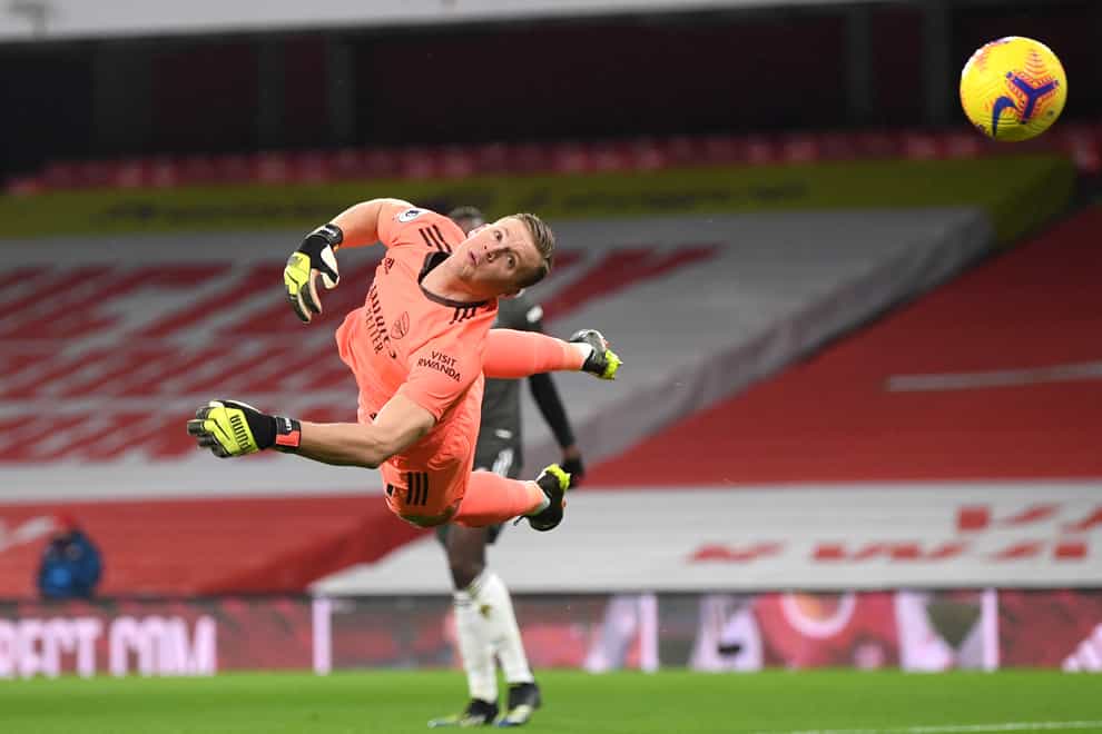 Arsenal goalkeeper Bernd Leno blocks a shot