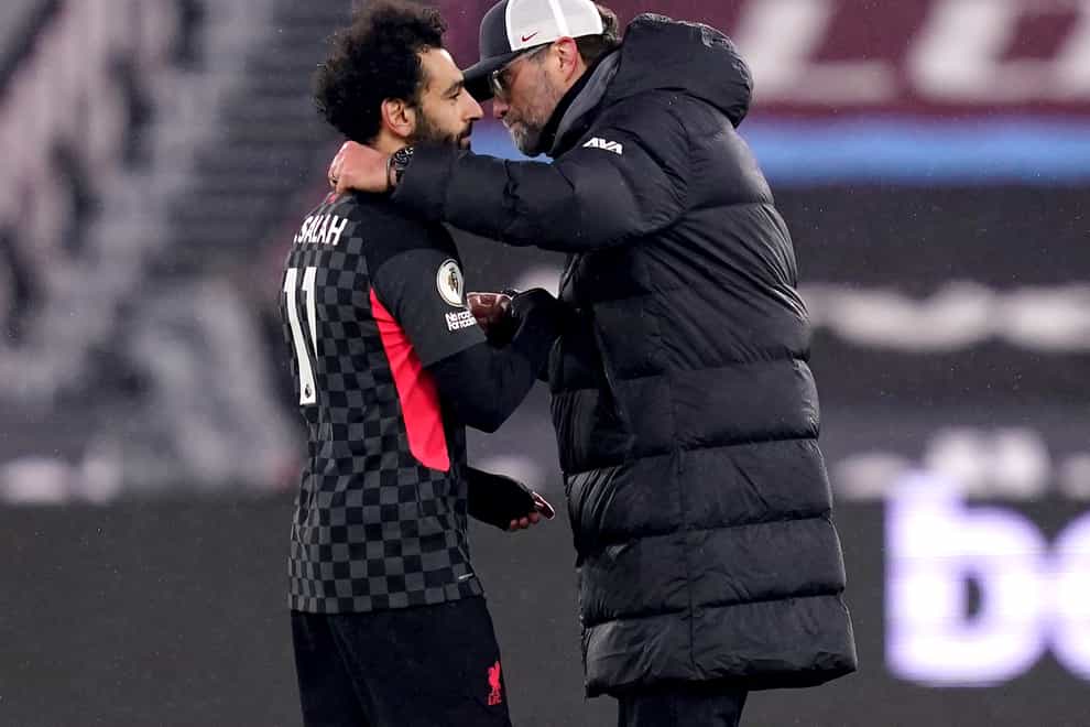 Jurgen Klopp, right, heaped praise on Mohamed Salah after he ended his goal drought