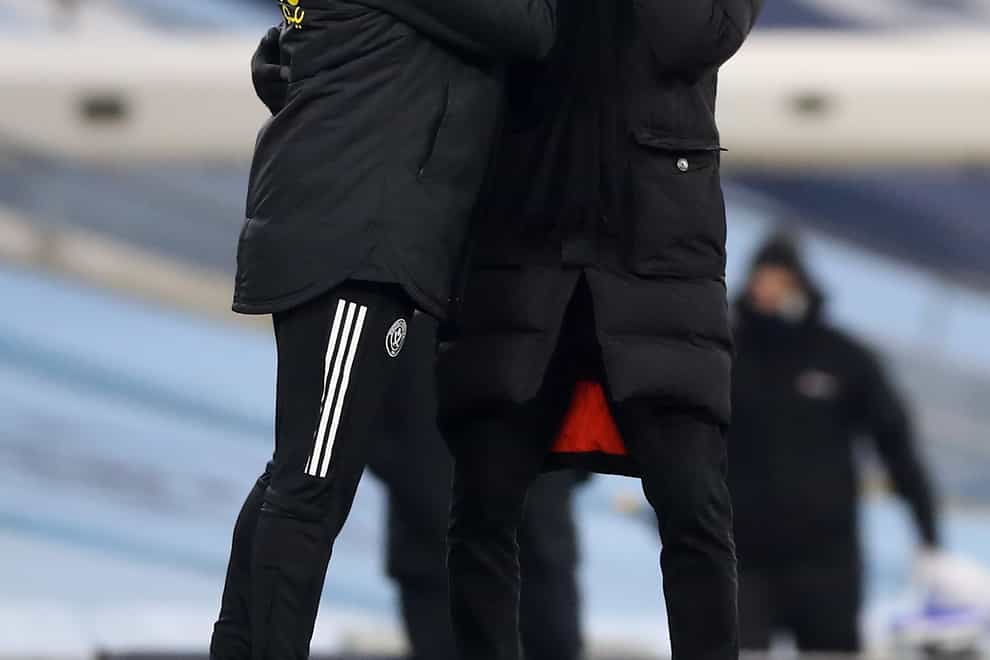 Pep Guardiola (right) is baffled Sheffield United are in the position they are