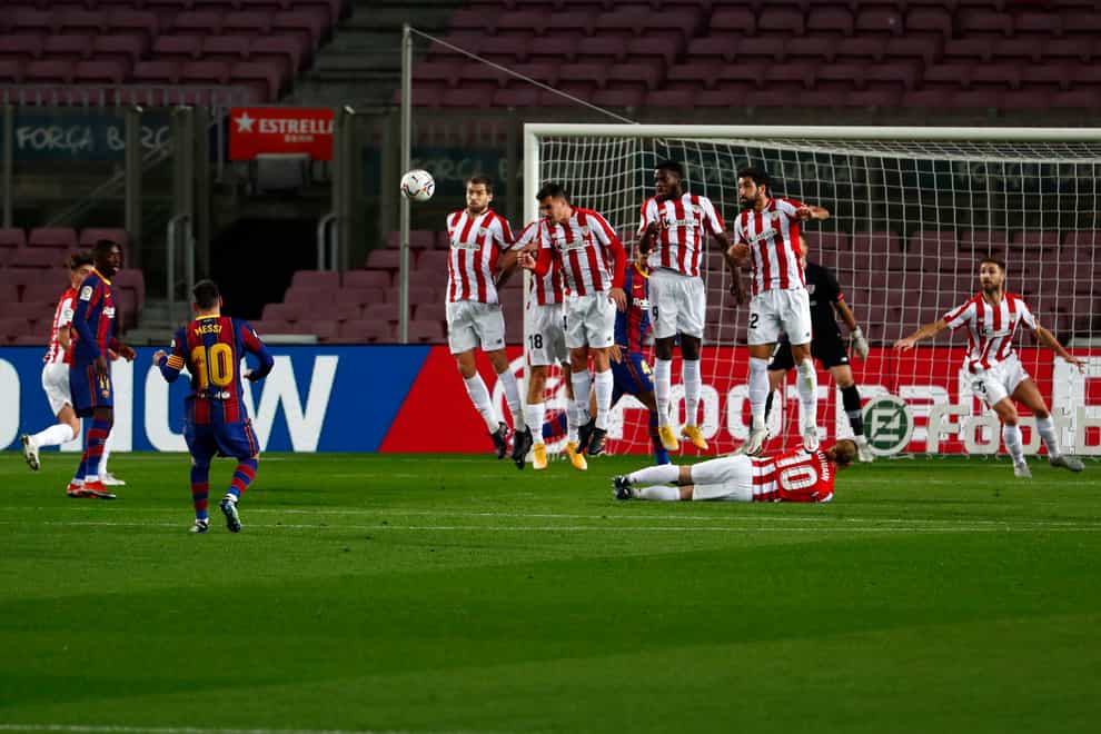 Lionel Messi opens the scoring with a free-kick in Barcelona's win over Athletic Bilbao (Joan Monfort/PA).