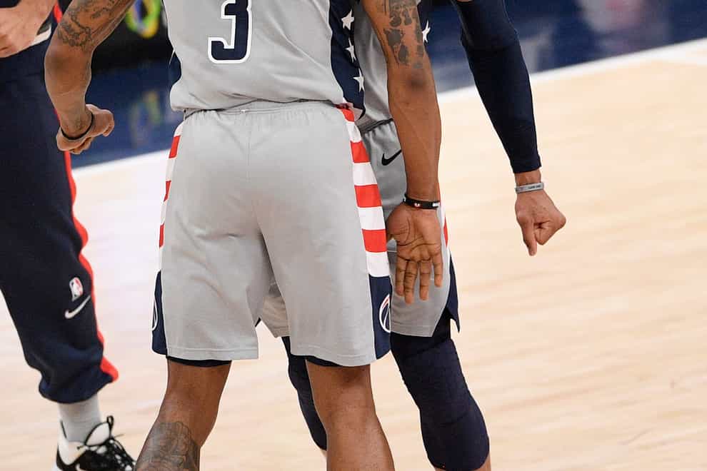 Washington Wizards guard Russell Westbrook celebrates with guard Bradley Beal