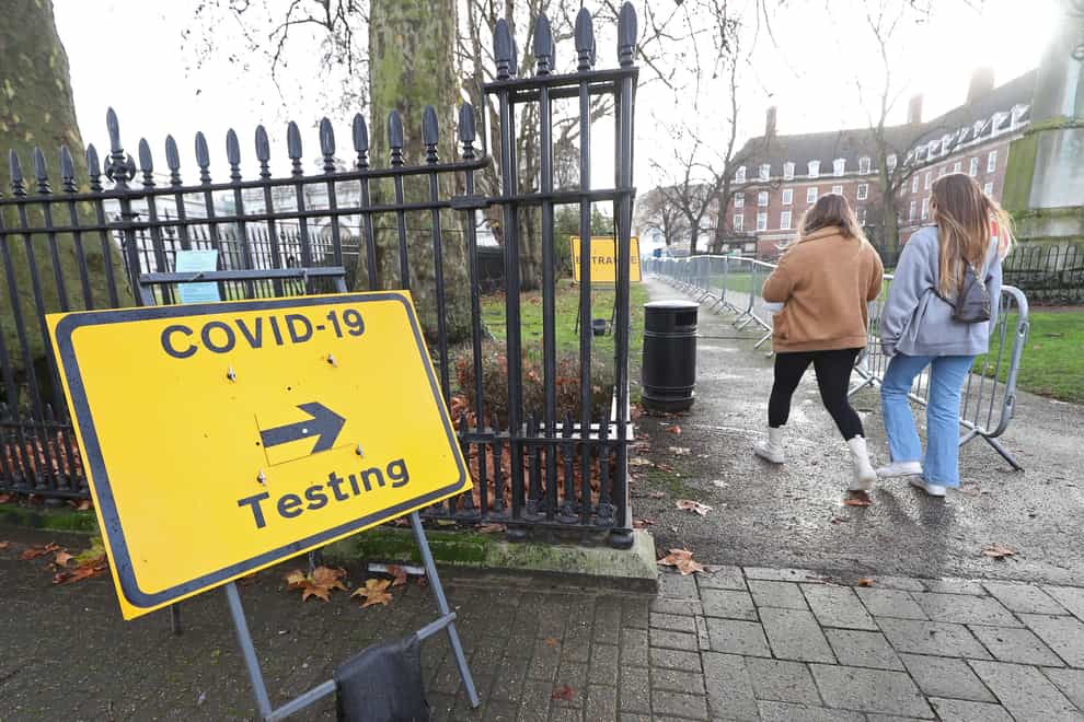 Two women entering a Covid testing site in Greenwich.