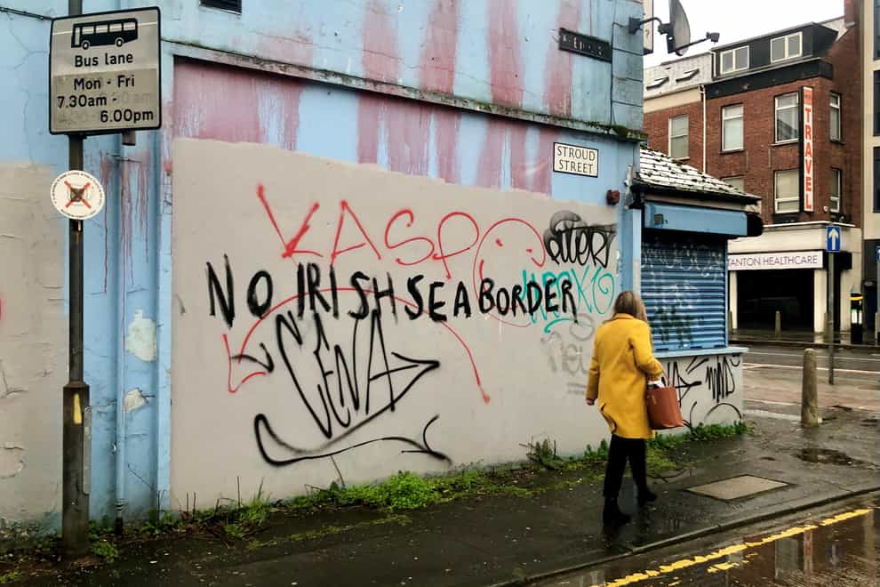 'No Irish Sea border' graffiti on a wall