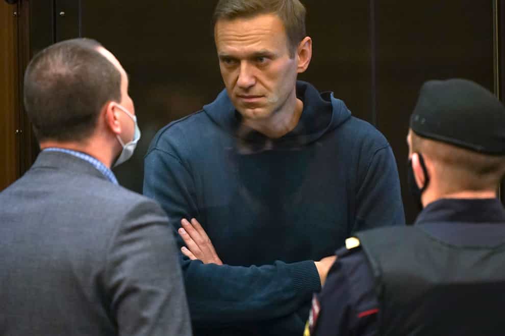 Alexei Navalny talks to one of his lawyers