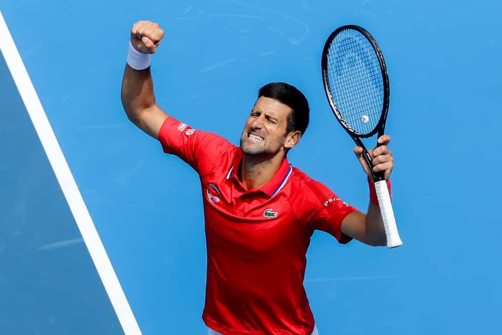 Novak Djokovic celebrates after defeating Denis Shapovalov