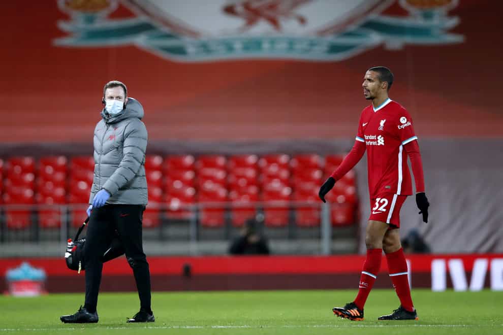 Liverpool defender Joel Matip leaves the field injured