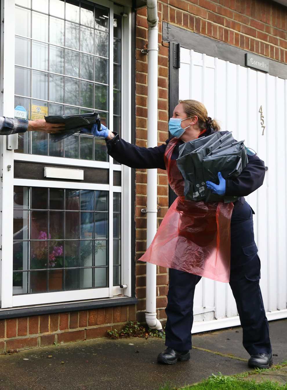 Door-to-door deliveries of testing kits have been made in some parts of England to catch the South African variant of coronavirus (Gareth Fuller/PA)