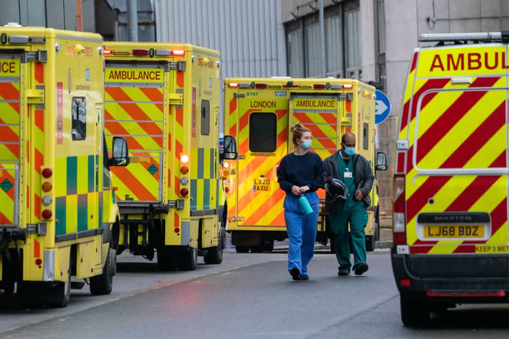 Medical personnel and ambulances outside the Royal London Hospital in London, during England’s third national lockdown (Dominic Lipinski/PA)