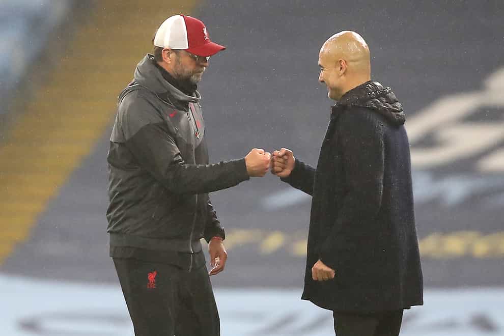 Pep Guardiola (right) has expressed surprise at comments from Jurgen Klopp (left)