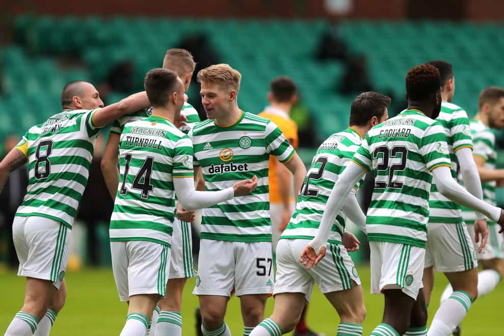 Stephen Welsh (centre) scores his first goal for Celtic (