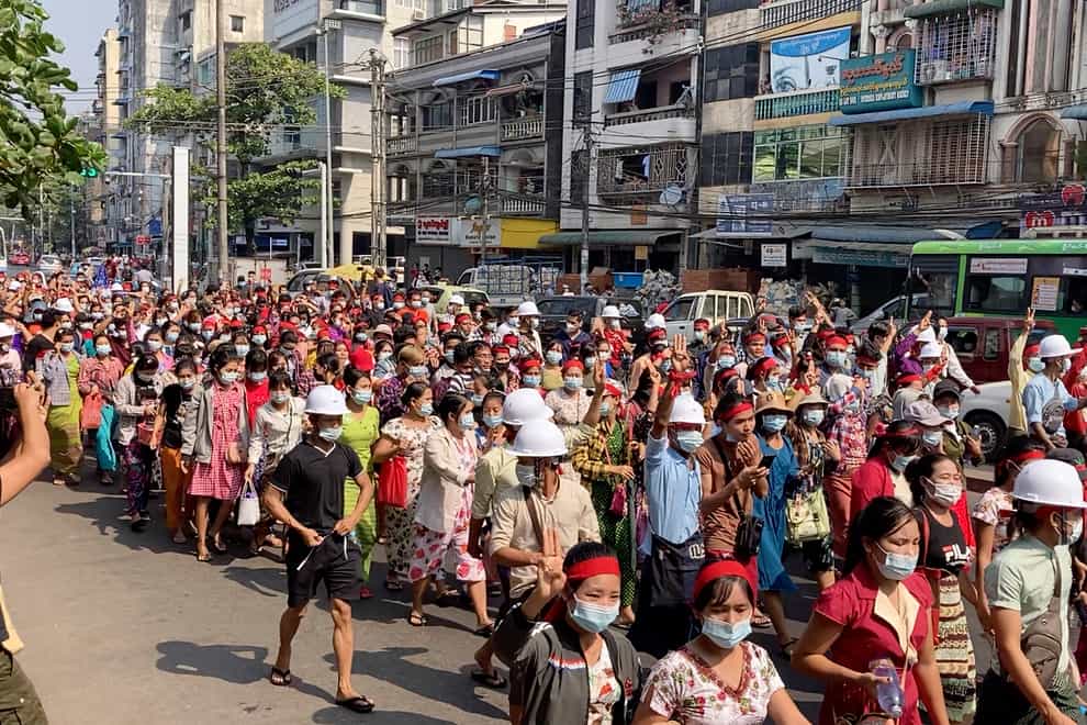 Protesters marching in Yangon