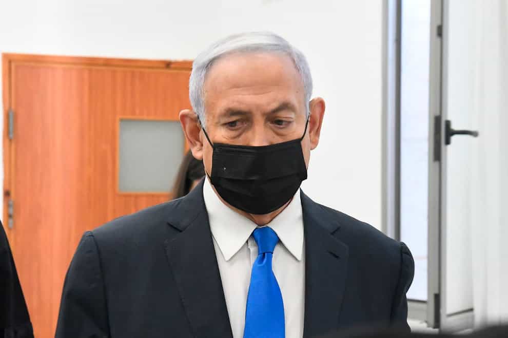 Israeli Prime Minister Benjamin Netanyahu arrives for a hearing at the district court in Jerusalem