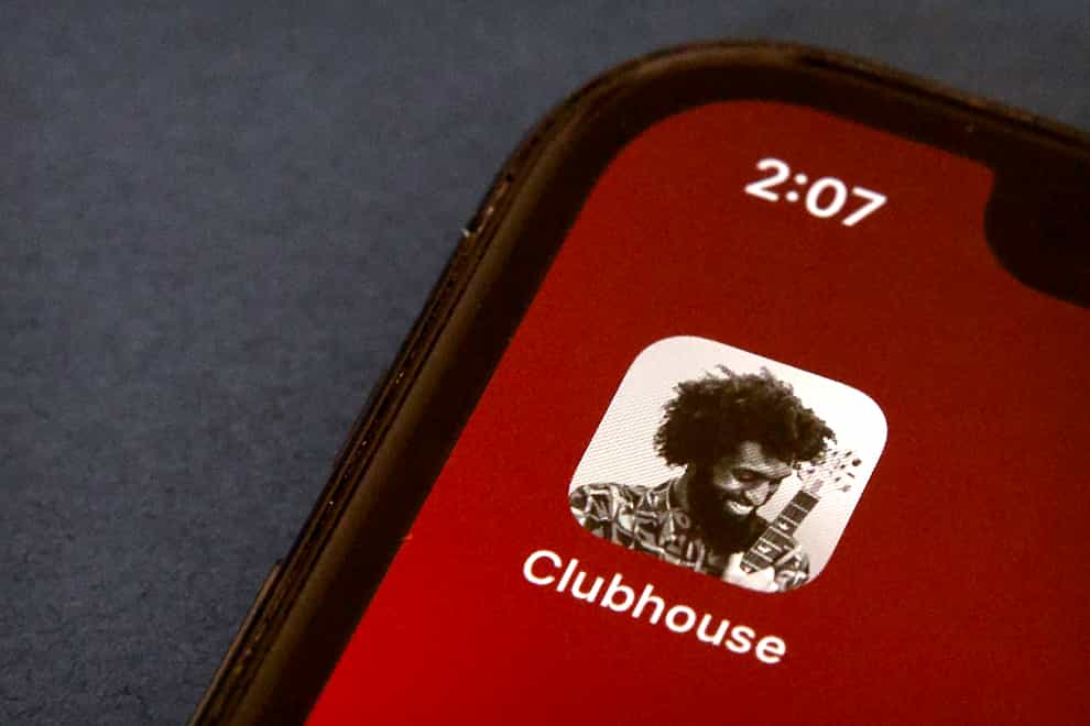 The icon for the social media app Clubhouse is seen on a smartphone screen in Beijing