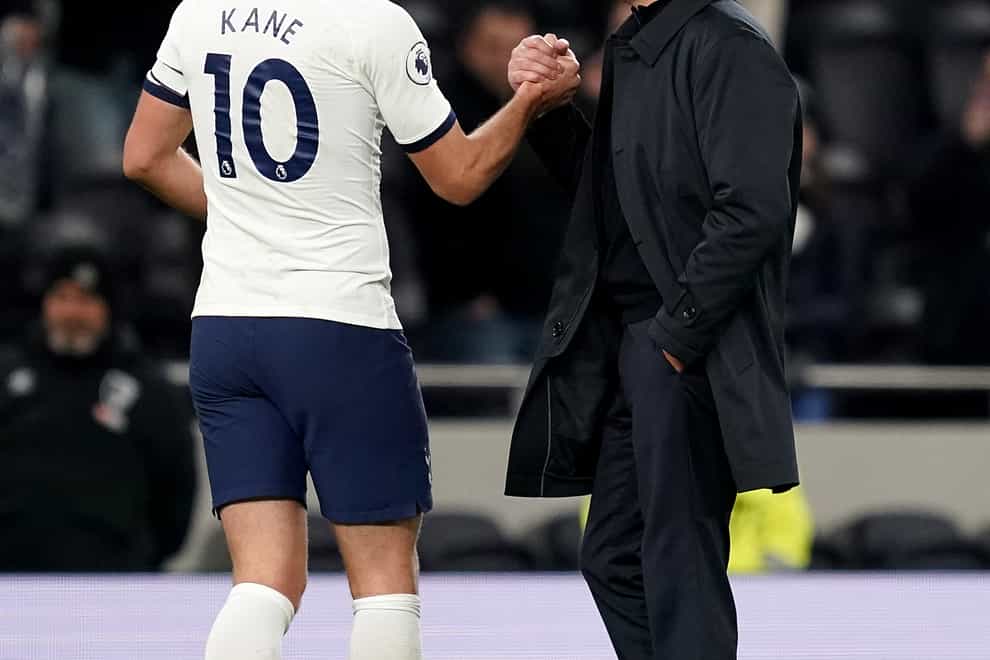 Jose Mourinho and Harry Kane embrace
