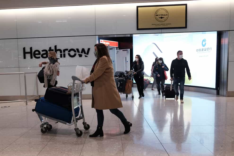 Passengers arrive at Heathrow Airport