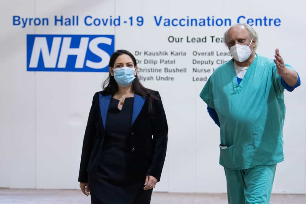 Priti Patel and Dr Dilip Patel at the Byron Hall vaccination centre in north London