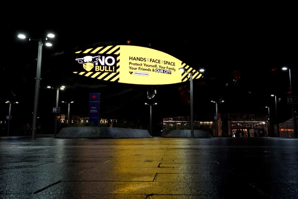 A giant coronavirus information sign outside New Street Station in Birmingham