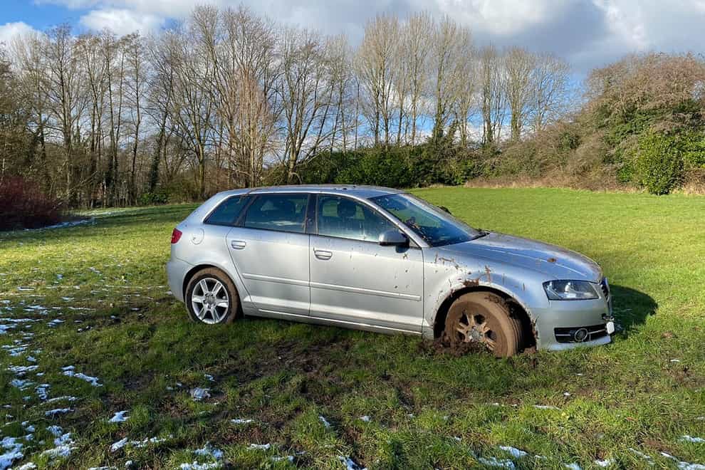The driver's Audi car stuck in the mud