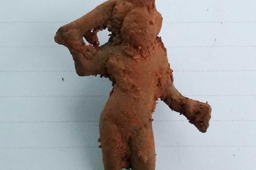 A 2,000-year-old Cupid figurine found among Roman artefacts on a stretch of the new A417 Missing Link route in Gloucestershire
