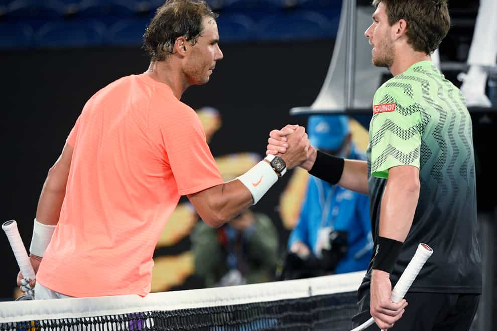 Rafael Nadal (right) shakes hands with Cameron Norrie