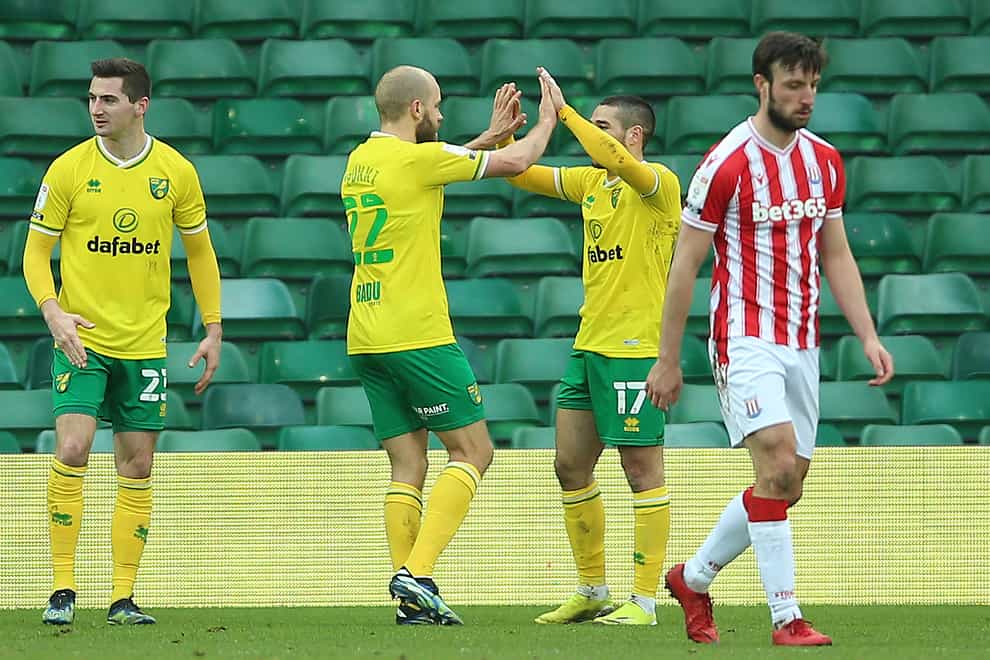 Teemu Pukki, second left, helped Norwich back to the top of the Championship