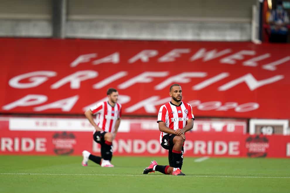 Brentford's Bryan Mbeumo takes the knee before the play-off semi-final second leg against Swansea