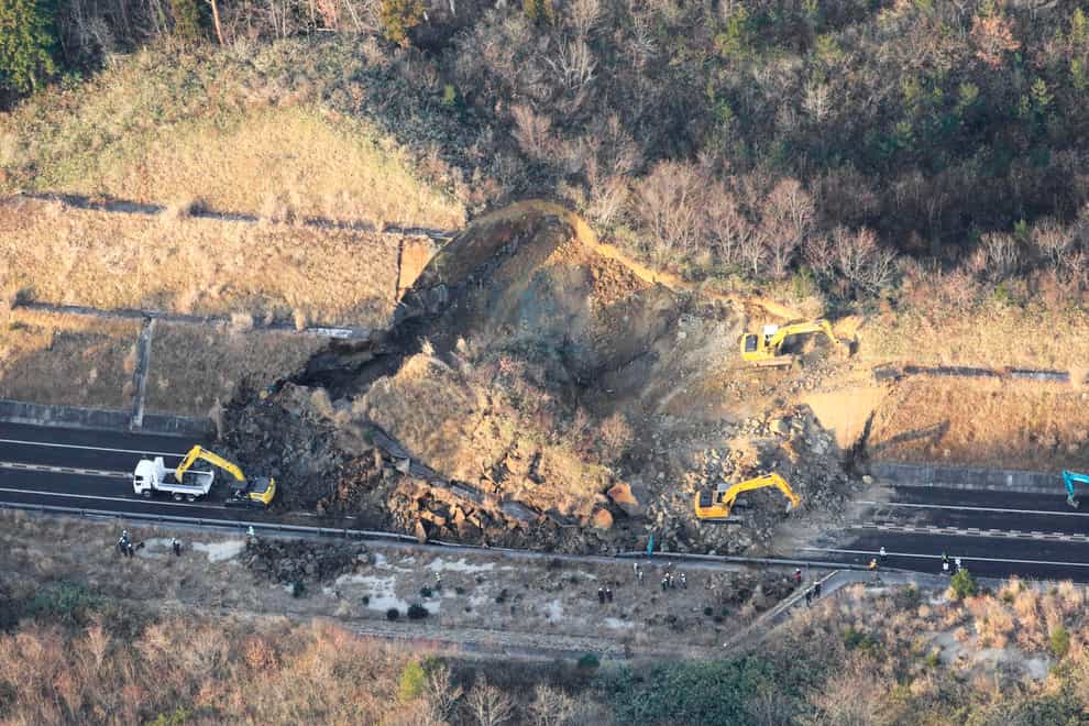 A portion of a highway is blocked by a landslide after an earthquake hit Fukushima prefecture in north-eastern Japan