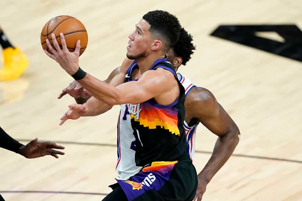 Phoenix Suns guard Devin Booker shoots during his side's win over the Philadelphia 76ers