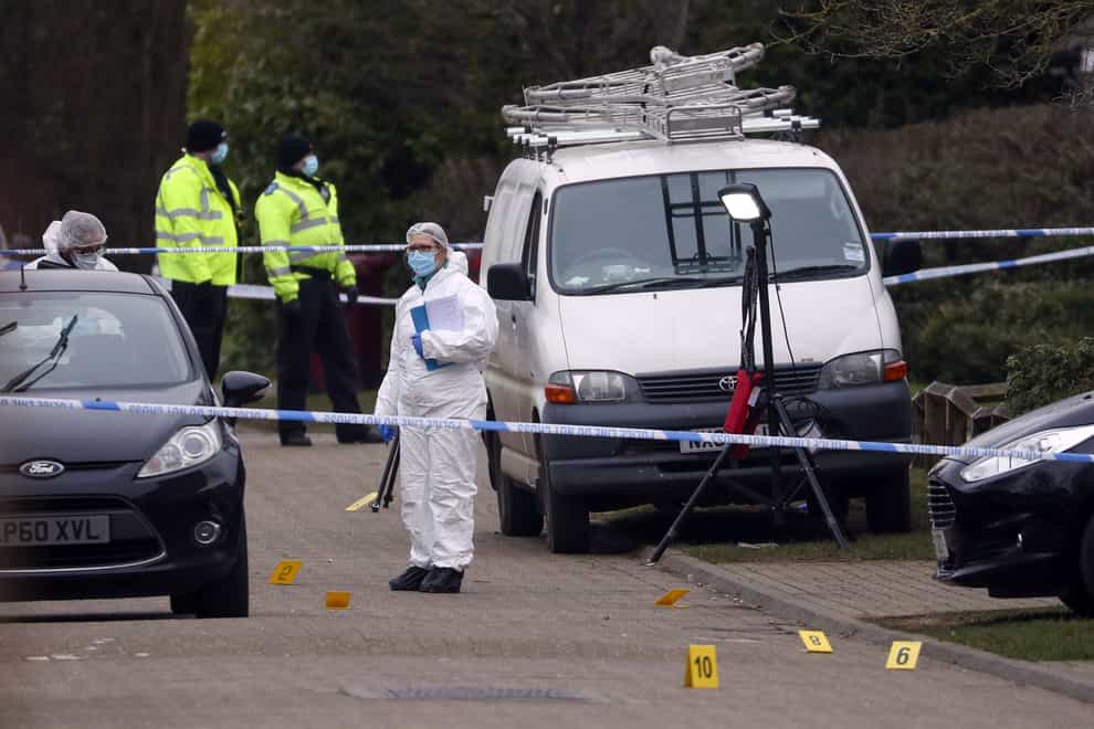 Forensics officers at the scene in Managua Close in Caversham